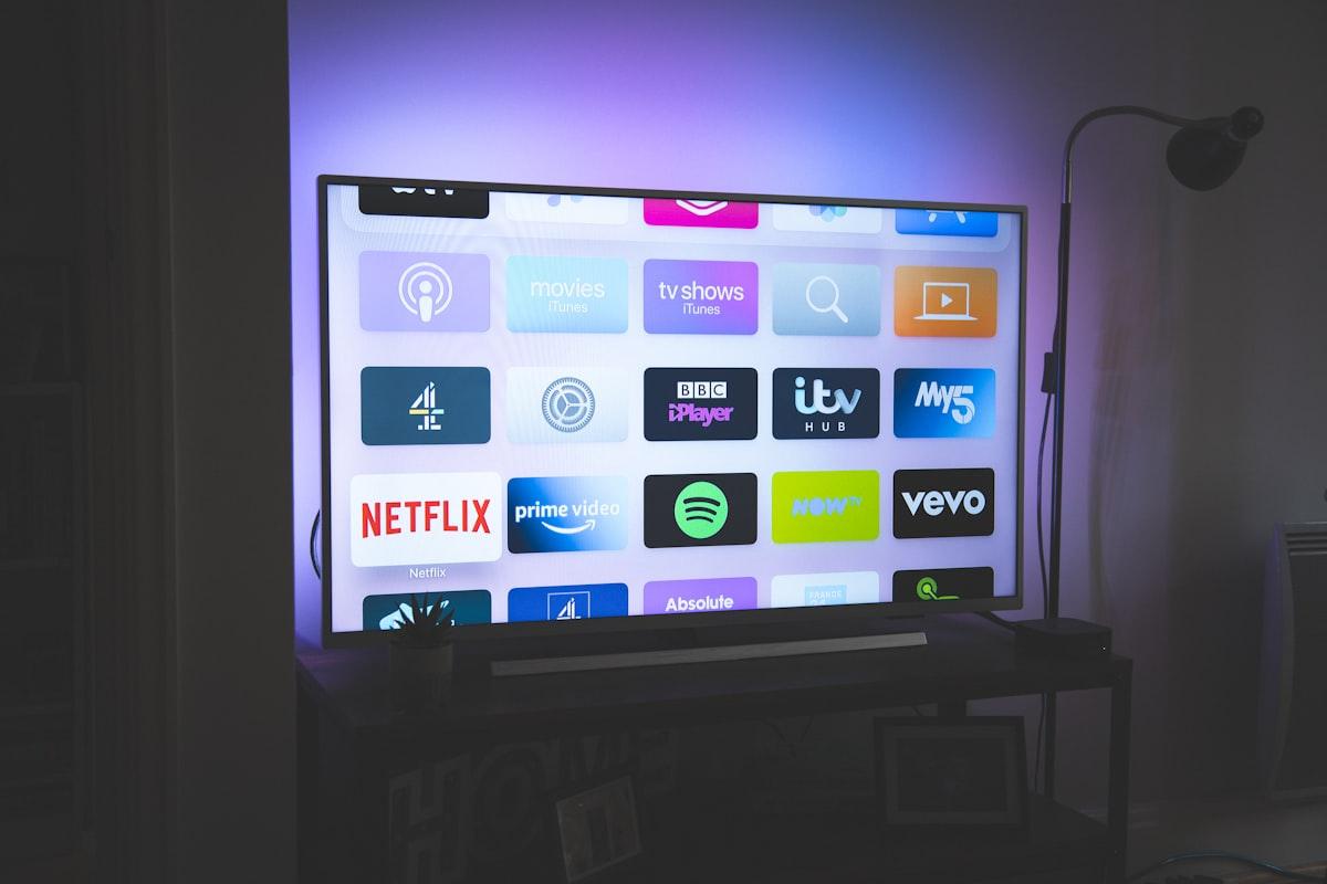 A modern television showing streaming app tiles