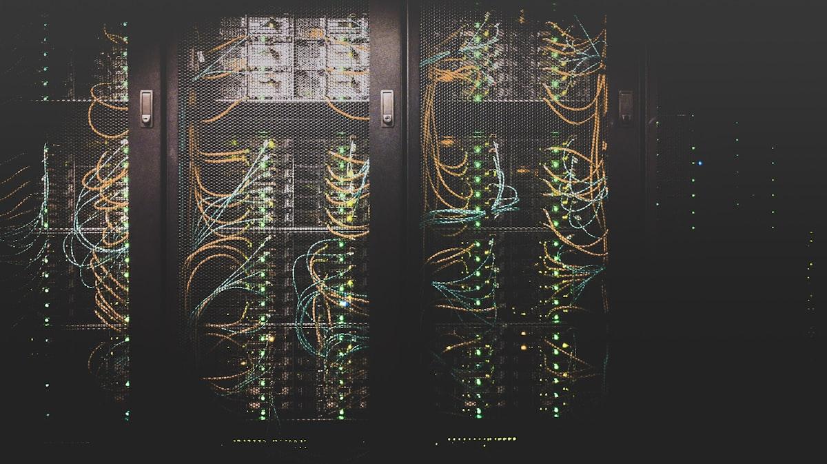 Network cables plugged into a server rack